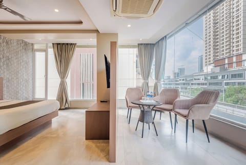 Superior Room, City View | Living area | Smart TV