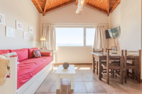 Apartment, 1 Bedroom, Lake View | Living area | 43-inch Smart TV with digital channels, Netflix, pay movies