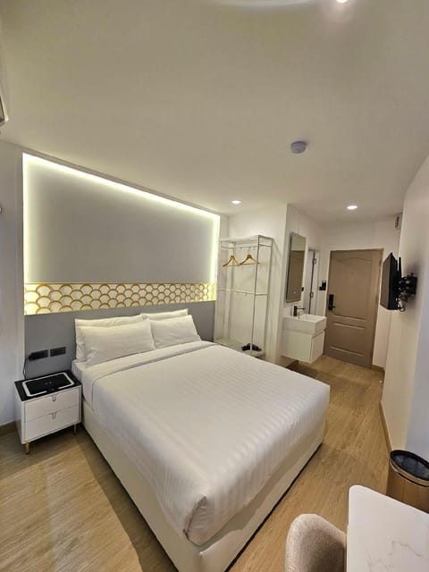 Standard Double Room, No Windows | In-room safe, desk, laptop workspace, blackout drapes