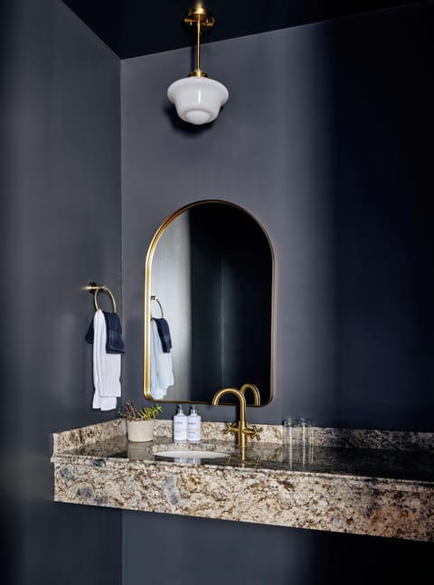 Designer toiletries, hair dryer, bathrobes, towels