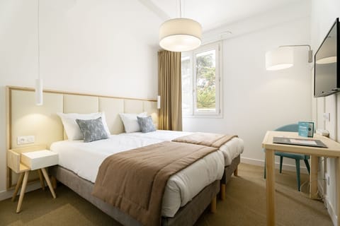 Twin Room, Garden View | Free WiFi, bed sheets
