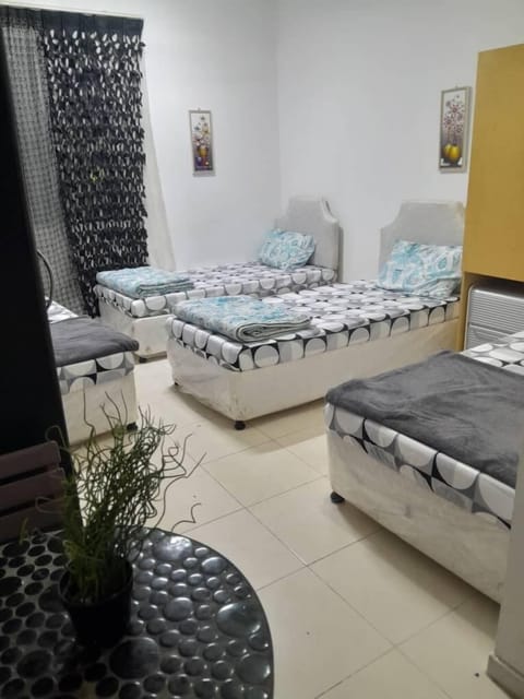Executive Quadruple Room | Desk, laptop workspace, soundproofing, iron/ironing board