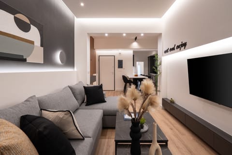 Exclusive Apartment | Living area | 55-inch Smart TV with cable channels