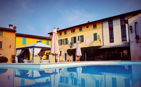 Outdoor pool, open 9:00 AM to 8:00 PM, sun loungers