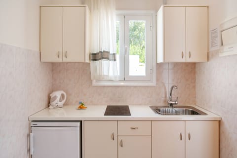 Studio with Sea View (3 Adults) | Private kitchen | Electric kettle, dining tables