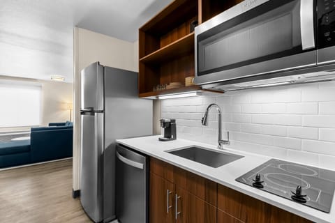 Suite, 1 Bedroom, Non Smoking | Private kitchen | Fridge, microwave, stovetop, dishwasher