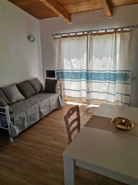 Apartment, Accessible | Living area | 22-inch flat-screen TV with cable channels, TV