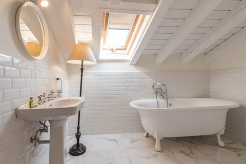 Signature Suite | Down comforters, desk, laptop workspace, soundproofing