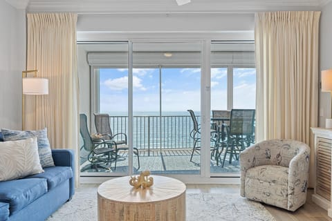 Condo, Multiple Beds (Regency Isle 503) | Living area | TV