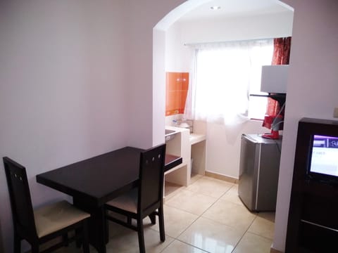 Mini-fridge, microwave, cookware/dishes/utensils