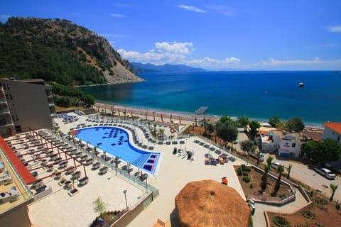 Indoor pool, outdoor pool, pool umbrellas, sun loungers
