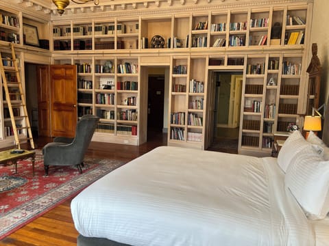 Library Suite, 1 King Bed | Premium bedding, minibar, in-room safe, desk