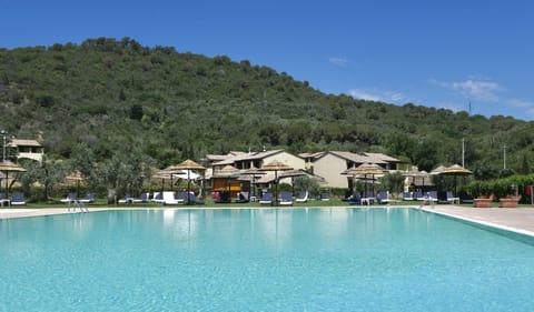 Seasonal outdoor pool, pool umbrellas, sun loungers
