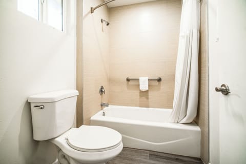 Shower, rainfall showerhead, towels, soap