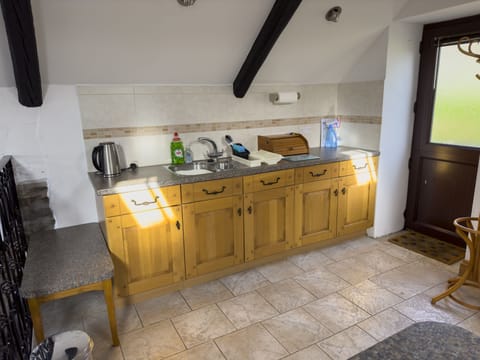 Fridge, electric kettle, toaster, cookware/dishes/utensils