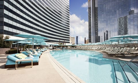 Seasonal outdoor pool, cabanas (surcharge), pool umbrellas
