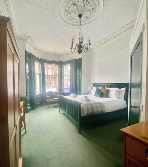 Deluxe Double Room | Desk, blackout drapes, iron/ironing board, free WiFi