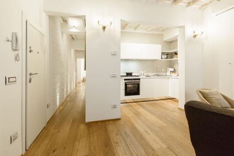 Comfort Apartment | Living area | 32-inch flat-screen TV with digital channels