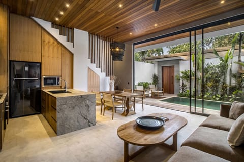 Deluxe Villa, 2 Bedrooms, Bathtub, Pool View | Living area | 32-inch Smart TV with digital channels