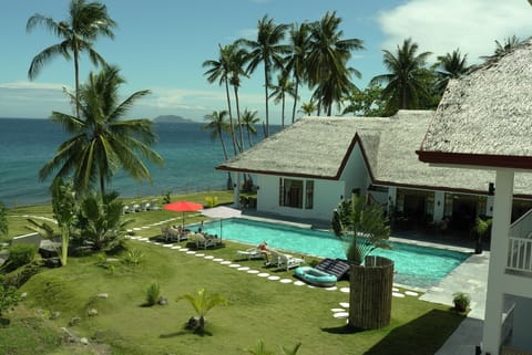 Outdoor pool, pool umbrellas, sun loungers