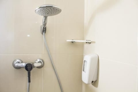 Shower, free toiletries, hair dryer, towels