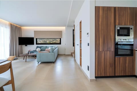 Luxury Villa | Private kitchen | Full-size fridge, microwave, oven, stovetop