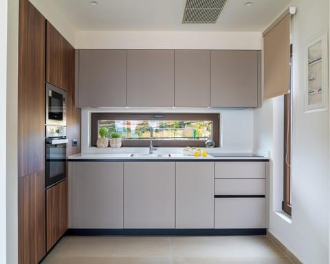 Luxury Villa | Private kitchen | Full-size fridge, microwave, oven, stovetop