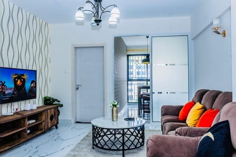 Business Apartment | Living area | 24-inch Smart TV with digital channels