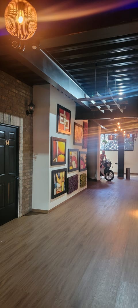 Business Quadruple Room, City View | Living area