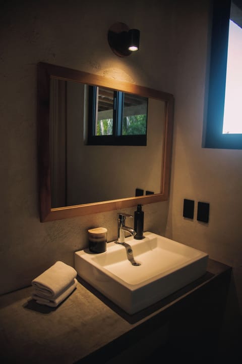 Shower, rainfall showerhead, towels, soap