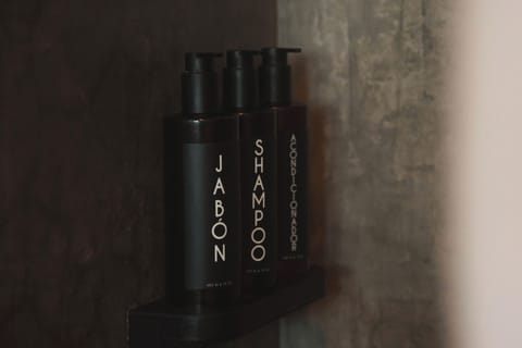 Shower, rainfall showerhead, towels, soap