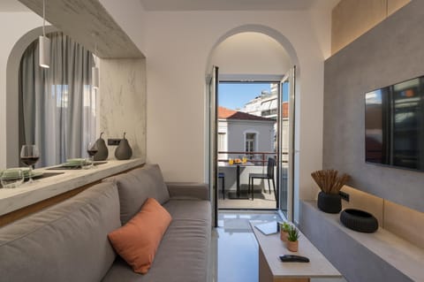 Premium Apartment | Living area | 43-inch Smart TV with cable channels