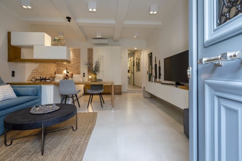 City Apartment | Living area | TV