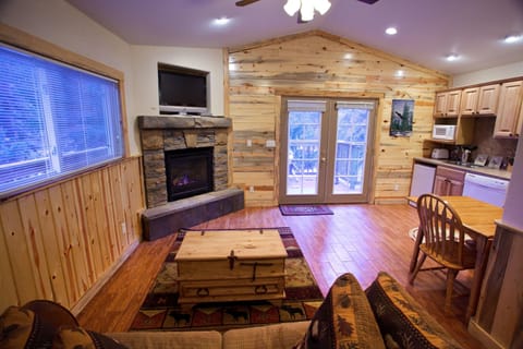 Riverfront Cottage | Premium bedding, pillowtop beds, individually decorated