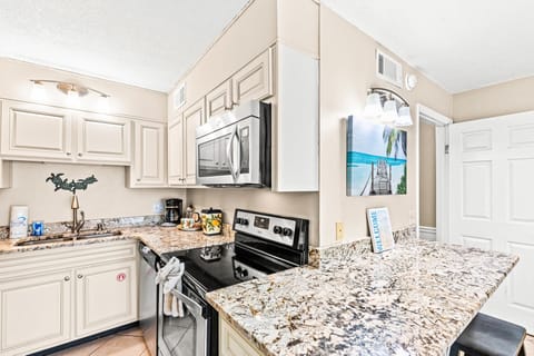 Condo, 1 King Bed with Sofa bed (The Summit 820) | Private kitchen | Oven, stovetop, dishwasher, cookware/dishes/utensils