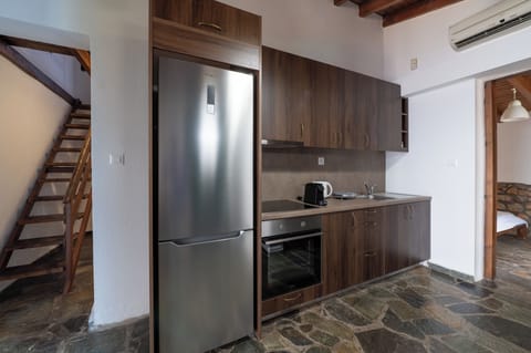 Family Apartment, 2 Bedrooms, Sea View, Poolside | Private kitchen | Mini-fridge, oven, stovetop, coffee/tea maker