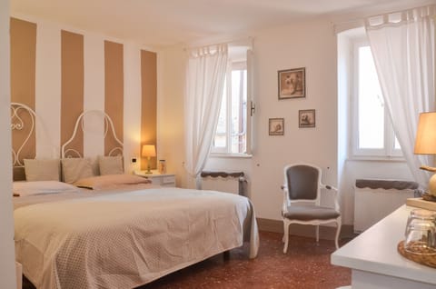 Deluxe Double Room, Private Bathroom, Tower | Down comforters, in-room safe, individually decorated