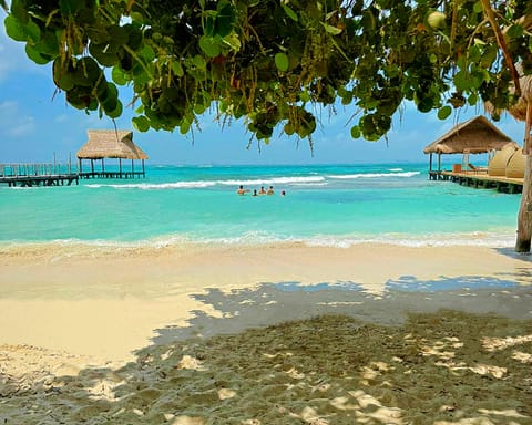 On the beach, sun loungers, beach towels