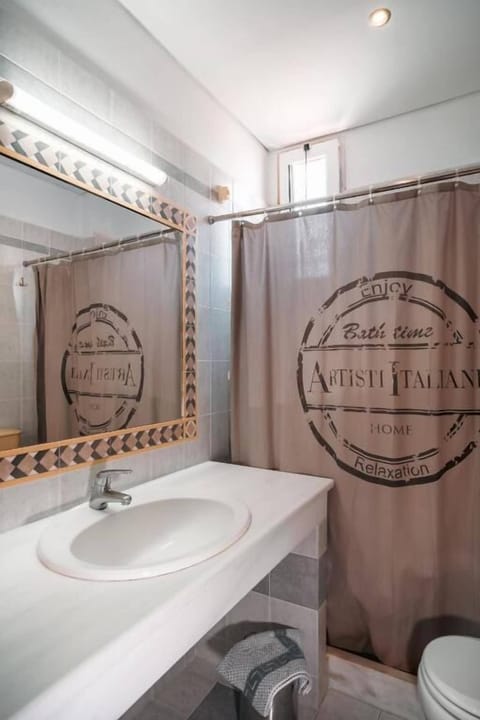 Shower, free toiletries, hair dryer, slippers