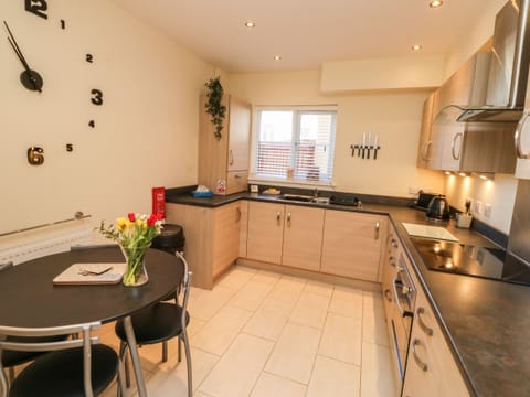 Fridge, electric kettle, toaster, cookware/dishes/utensils