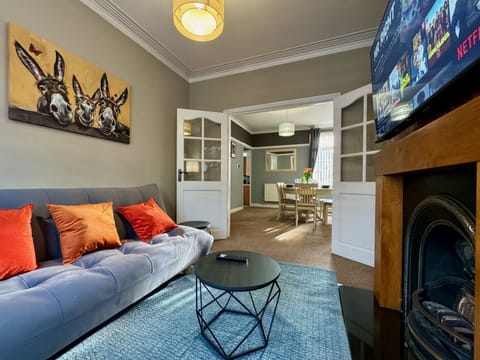 Family House | Living area | 55-inch Smart TV with digital channels, fireplace