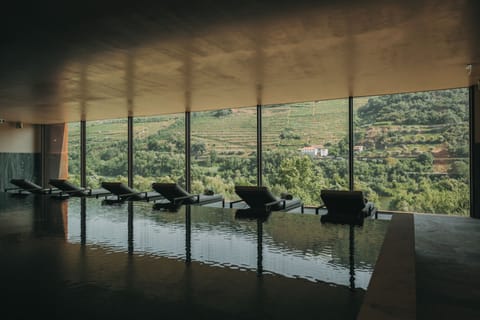 Indoor pool, outdoor pool, pool umbrellas, sun loungers