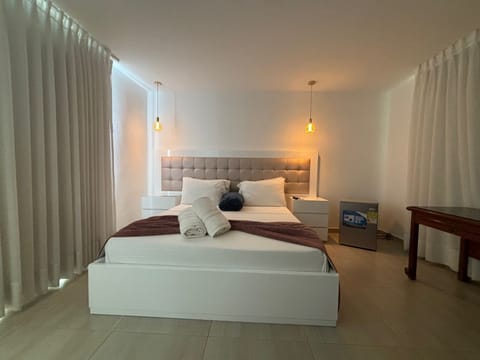 Deluxe Double Room, Pool View | Individually decorated, individually furnished, desk, laptop workspace