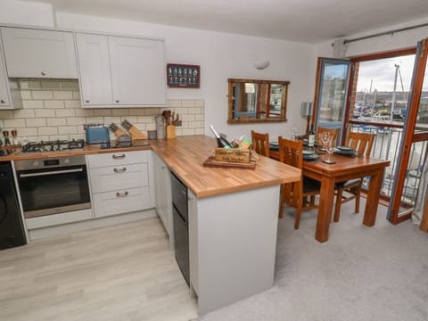 Fridge, electric kettle, toaster, cookware/dishes/utensils