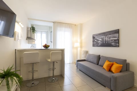 Comfort Apartment | Living area | Flat-screen TV