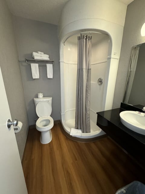 Shower, towels, soap, toilet paper