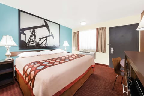 Desk, laptop workspace, blackout drapes, free cribs/infant beds