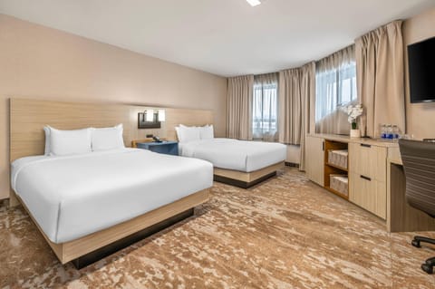 Premium bedding, desk, blackout drapes, soundproofing