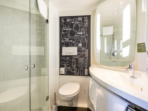 Shower, eco-friendly toiletries, hair dryer, towels