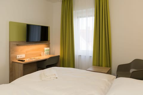 Frette Italian sheets, premium bedding, down comforters